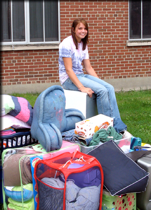 girl on luggage