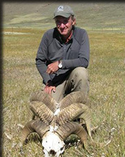 James Gibbs in a field with antlers