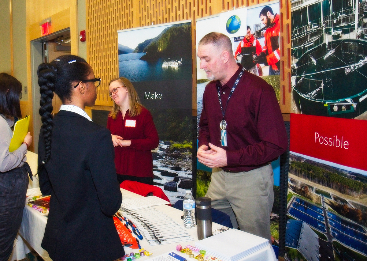 An ESF student talks with a recruiter at the 2020 ESF career and internship fair