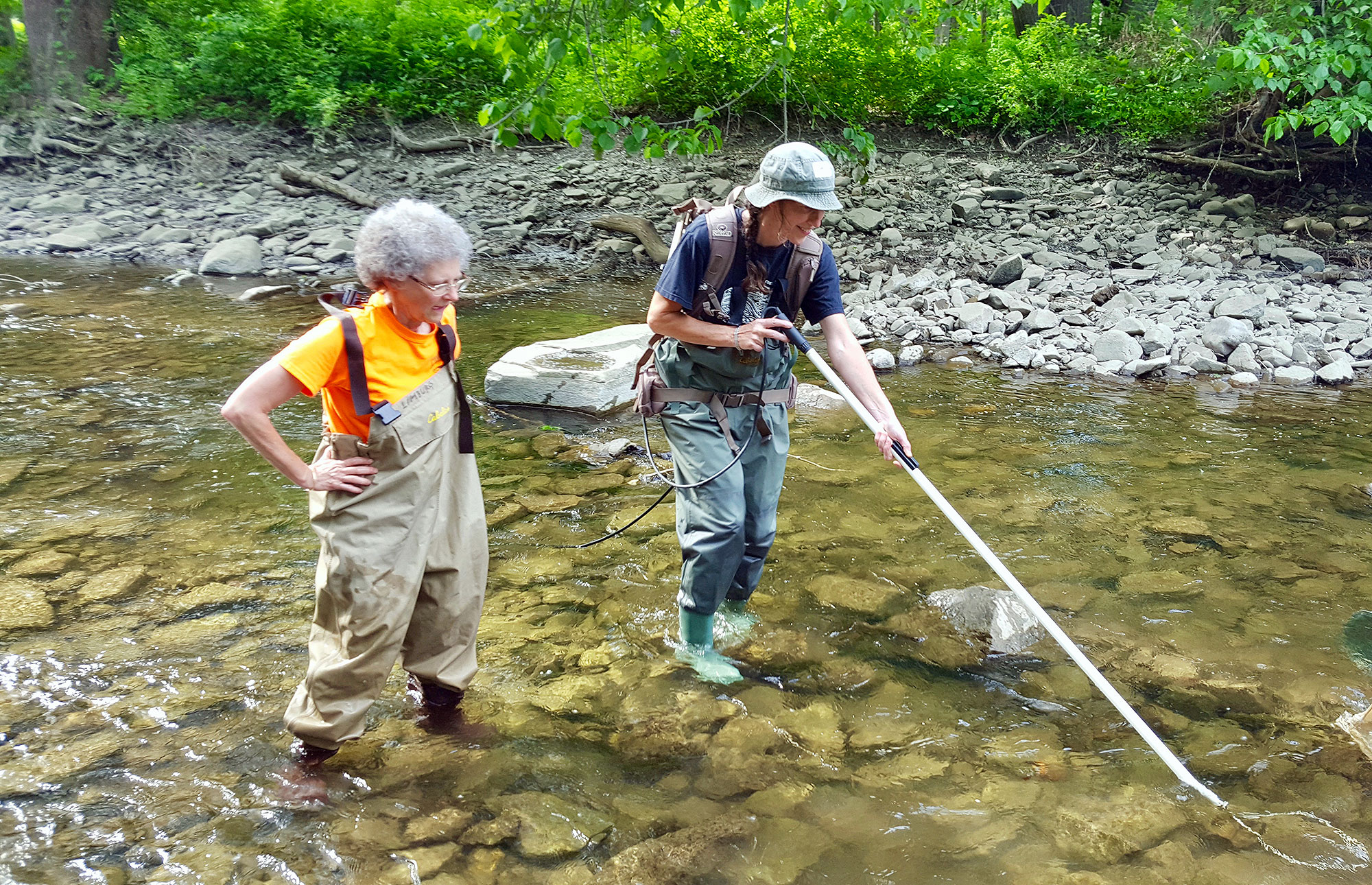 Dr. Karin Lamburg (left) and her colleague, Elizabeth Logiudice, in the field.