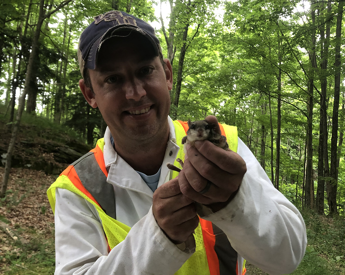 Dr. Brian Leydet with a small mammal