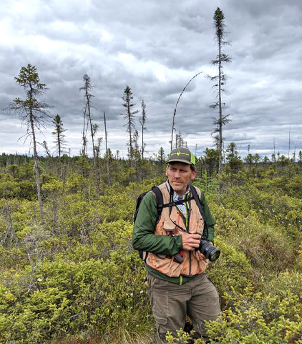 A guy with a camera in Shingle Shanty Preserve