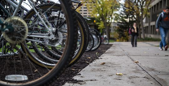 ground level view of bikes parked along ESFs quad