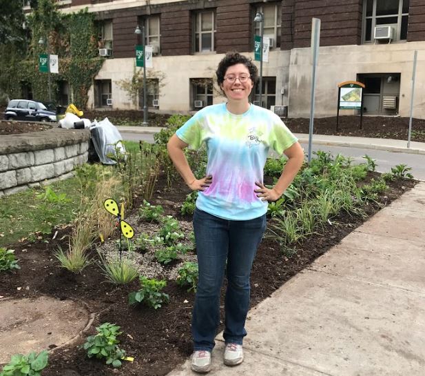 Molly stands proudly in front of new habitat