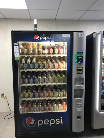 Vending machine without plastic beverage containers