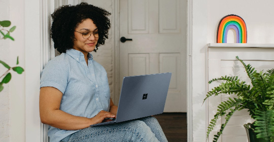 A girl working on a laptop