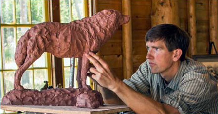 George Bumann working on a sculpture