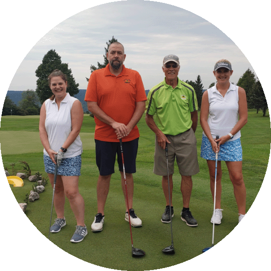 Golfers posing at the 2022 tournament.