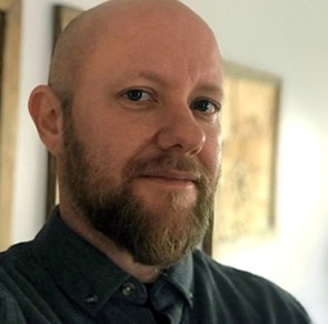 headshot of aidan ackerman