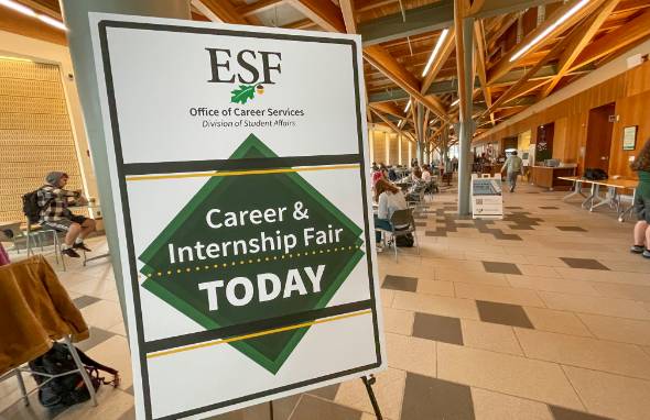Gateway Center concourse with Career and Internship Fair Today sign in foreground.
