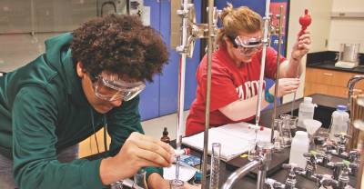 Students working in a chemistry laboratory.