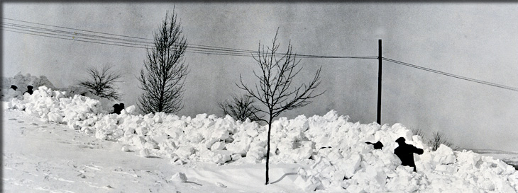 Shoveling heaps of snow in March 1932.