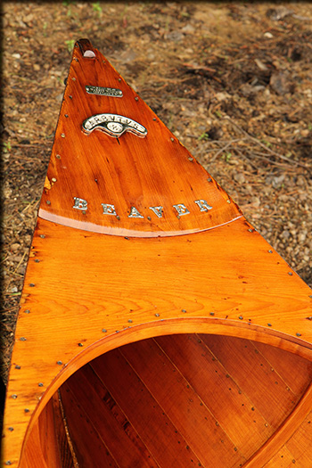 A gleaming wooden Adirondack guide boat, made from pine and cherry, and sporting original cane seats and graceful oars along with a history that dates to Theodore Roosevelt's presidency, is again gliding through the waters of the Central Adirondacks where it was crafted at the turn of the 20th century.