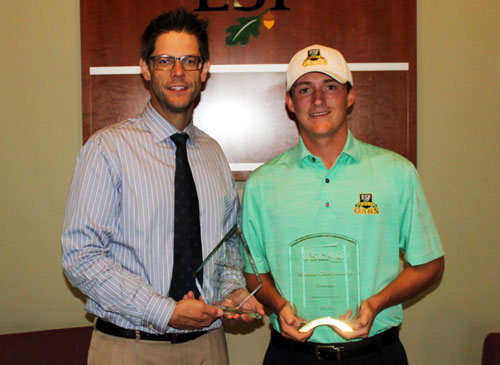 Golf Head Coach John Turbeville (left) and Sean Barron