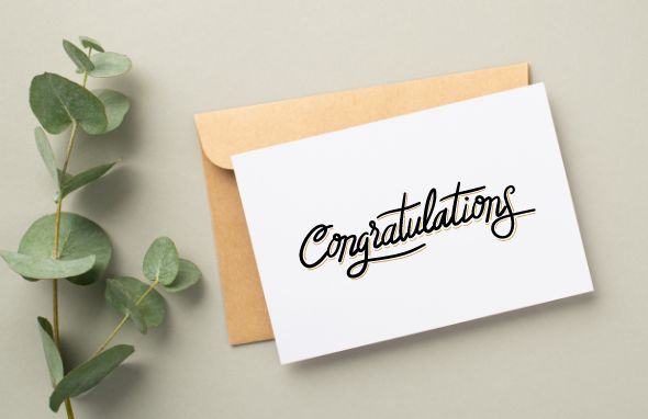 Vine, envelope, and card reading "Congratulations"