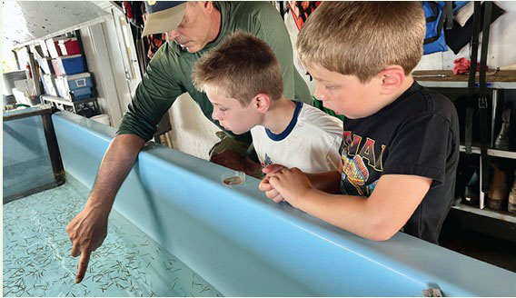 John Farrell with Manuson's grandsons