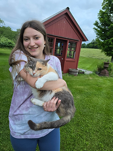Magdala Klein holding a cat