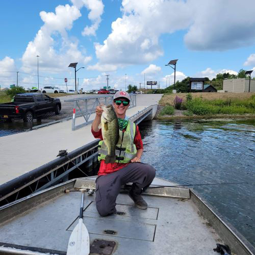 nick sanderson holding a fish