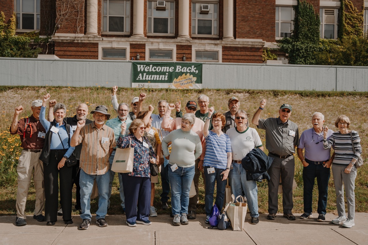Group of Ranger School graduates holding class of 2024 sign