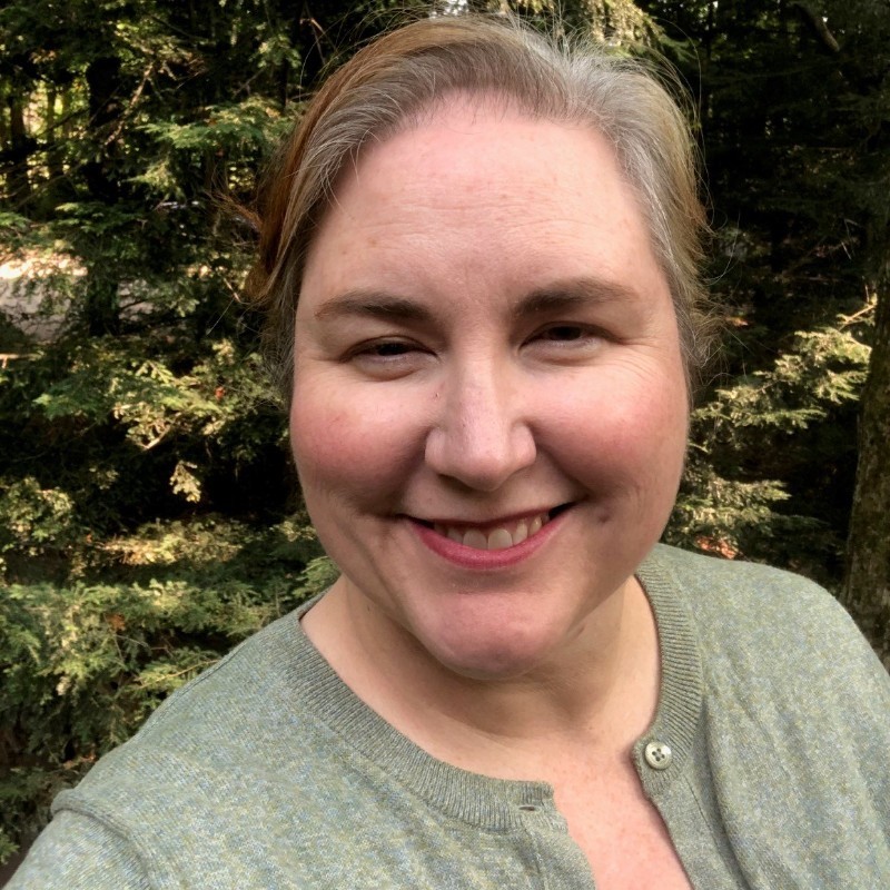 headshot of Laurie Kutina smiling