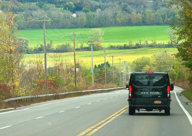 Open roadway with ESF vehicle heading away from camera.