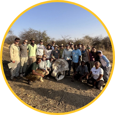 Group of students working in the field in Tanzania