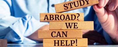 Stacked bricks reading "Study Abread? We can help!"