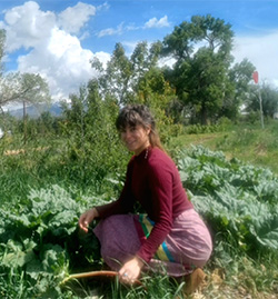 autumn raasch working in a garden