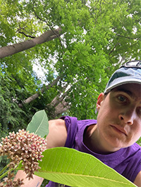 Sarah Howard with a flower