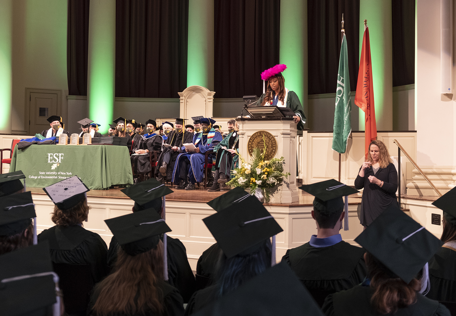 Student at a podium making graduation speech