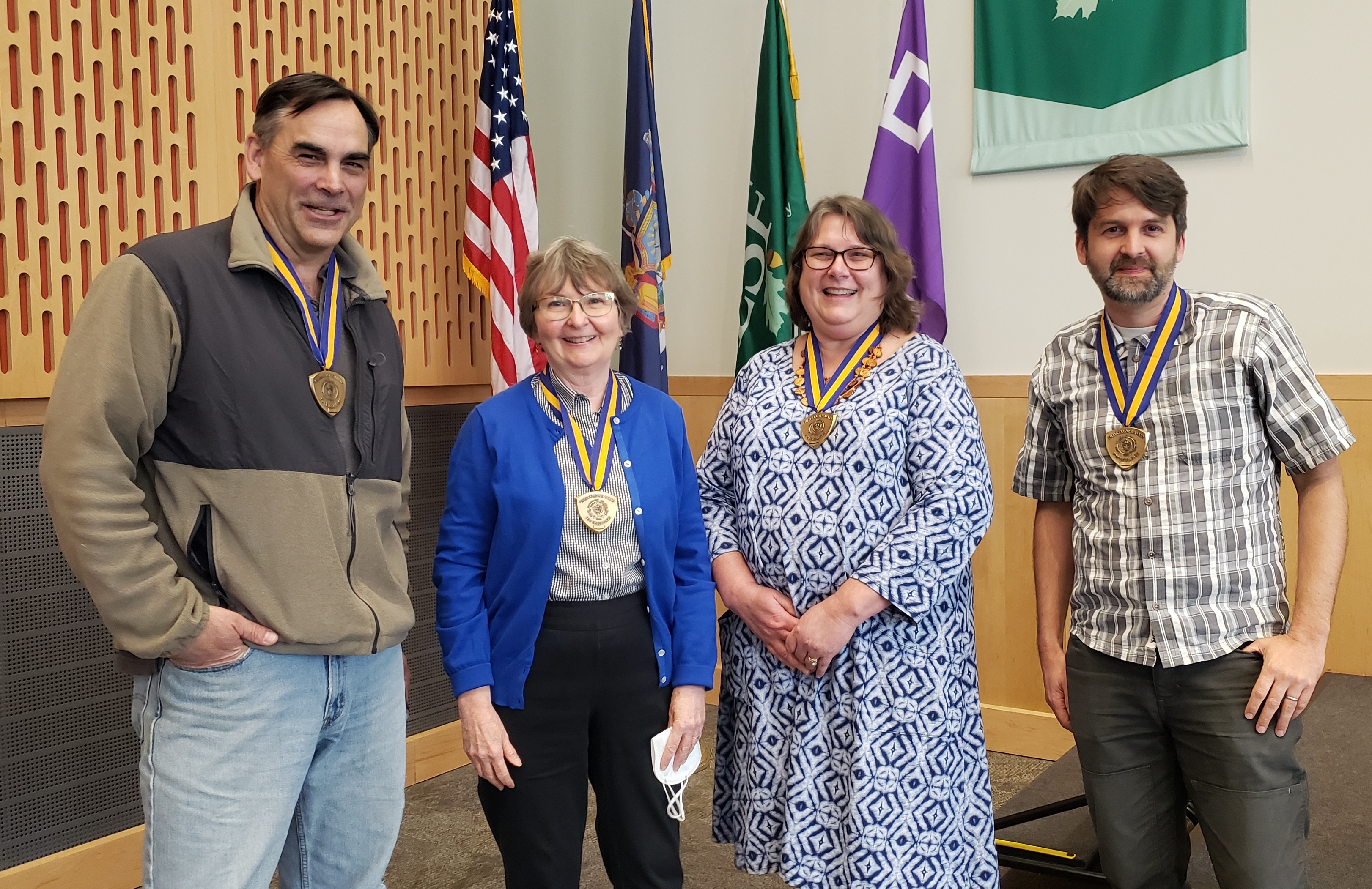 chancellor award honorees Dr John Farrell, Maren King, Maura Stefl and Dr. Stephen Shaw wearing medals