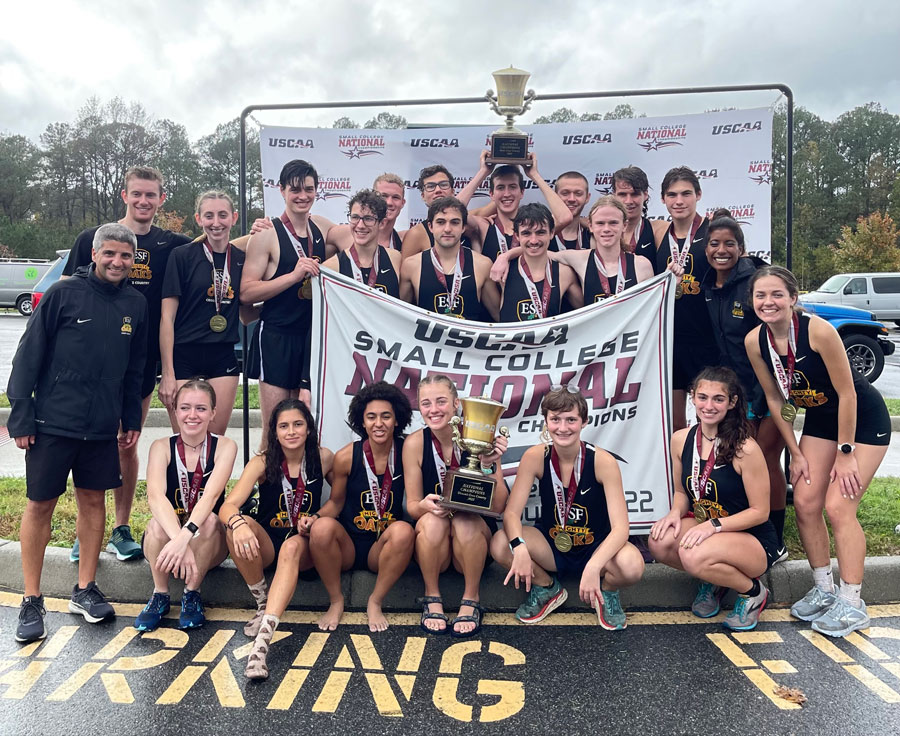 E S F men and women's cross-country team with coach Mike Melfie after receiving their respective trophies.