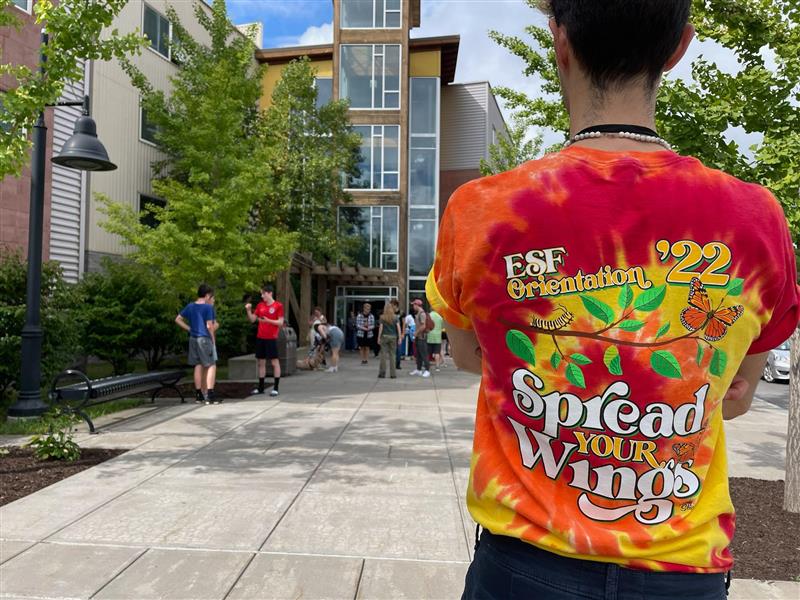 orientation leader in front of centennial hall