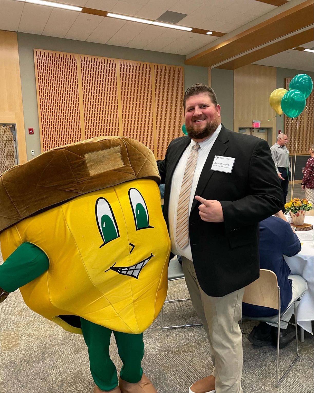 Ryan Henry with E S F mascot Oakie