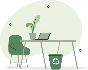 Image of a desk, chair, laptop, plant and recycling bin.