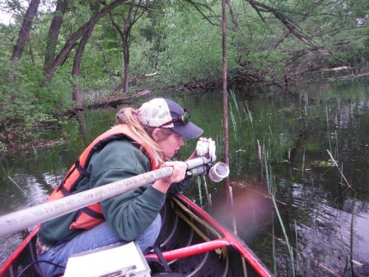 student working in the river