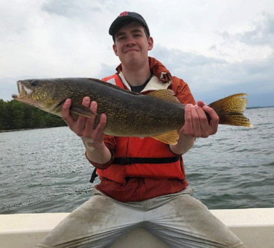 Max Wilder holding a fish