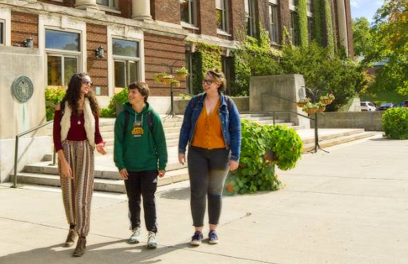 Students walking outside of Bray Hall.