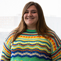 Lauren in a colorful sweater